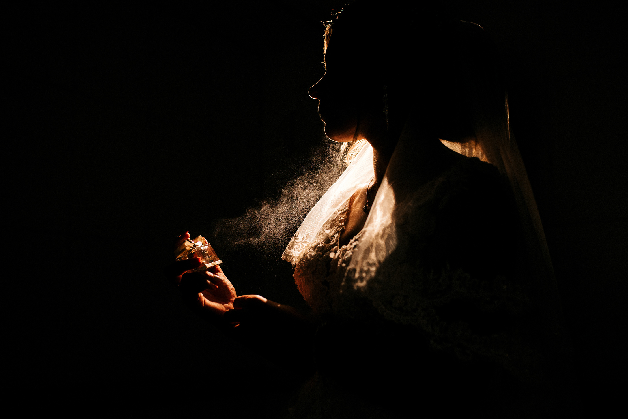 Bride Spraying Perfume